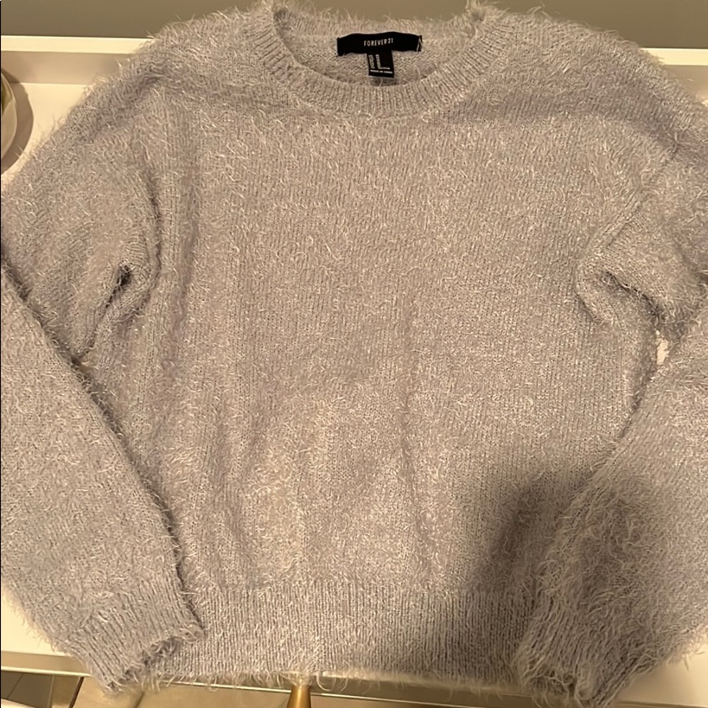 light blue fuzzy sweater